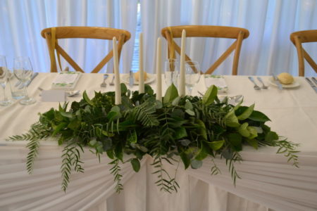 Bridal table greenery candelabras