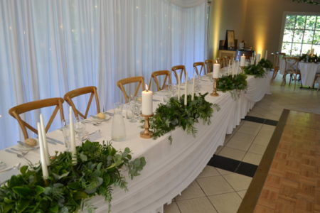Bridal table greenery candelabras