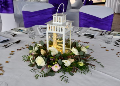 Lantern with flower wreath