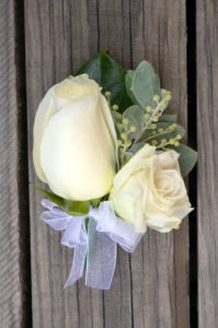White rose and lisianthus buttonhole