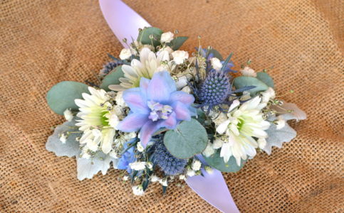 Pastel blue and white diamond wrist corsage